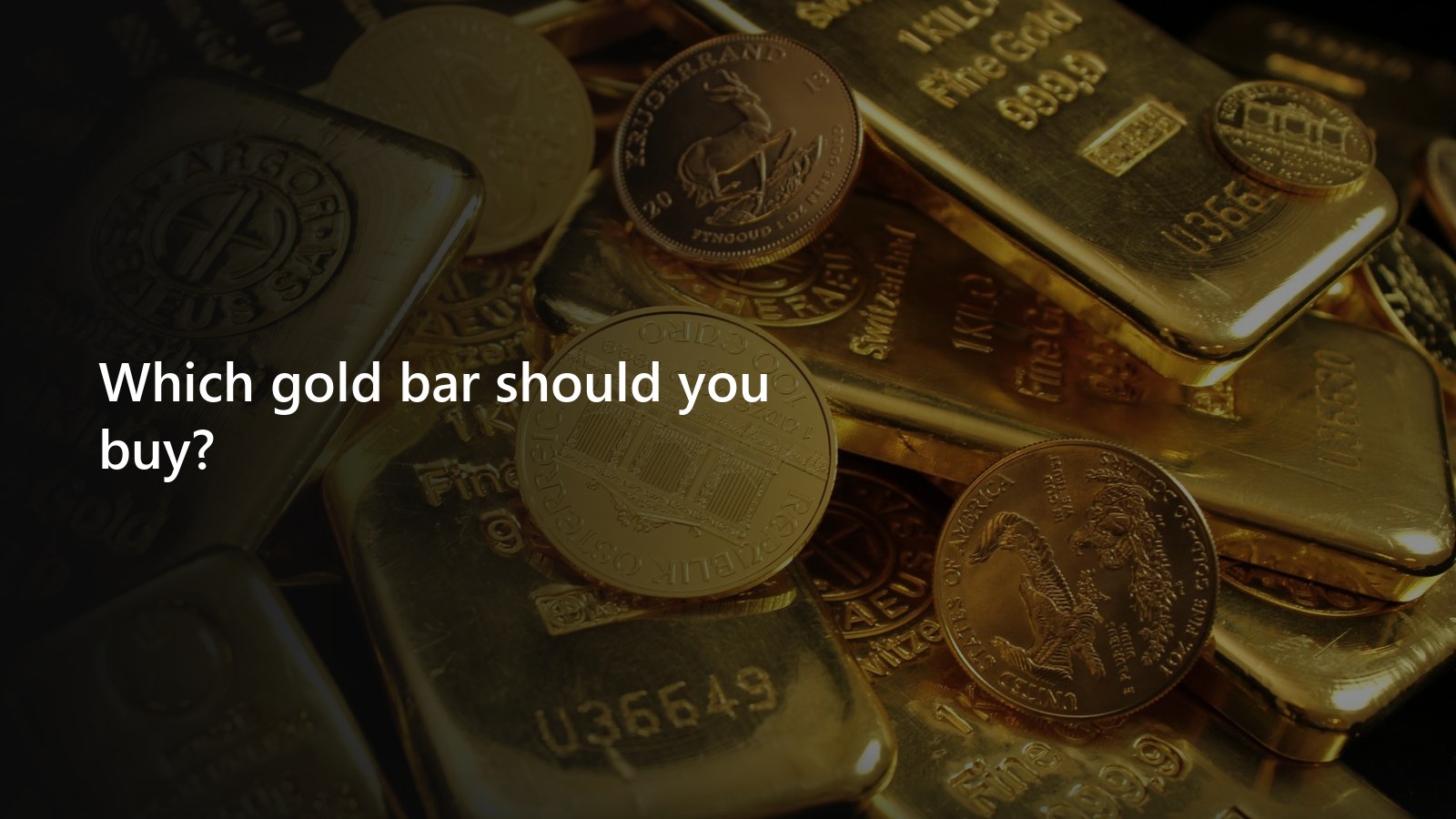 Gold bars and minted bars on a black background